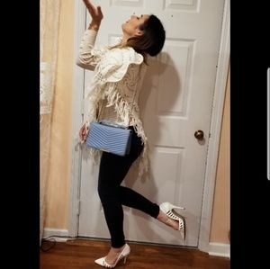 White handmade pancho